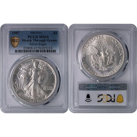 1987 American Silver Eagle Mint Error Struck Through Grease - PCGS MS 65 - Gem Brilliant Uncirculated