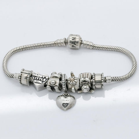 Authentic Pandora Sterling Silver Bracelet with 7 Charms
